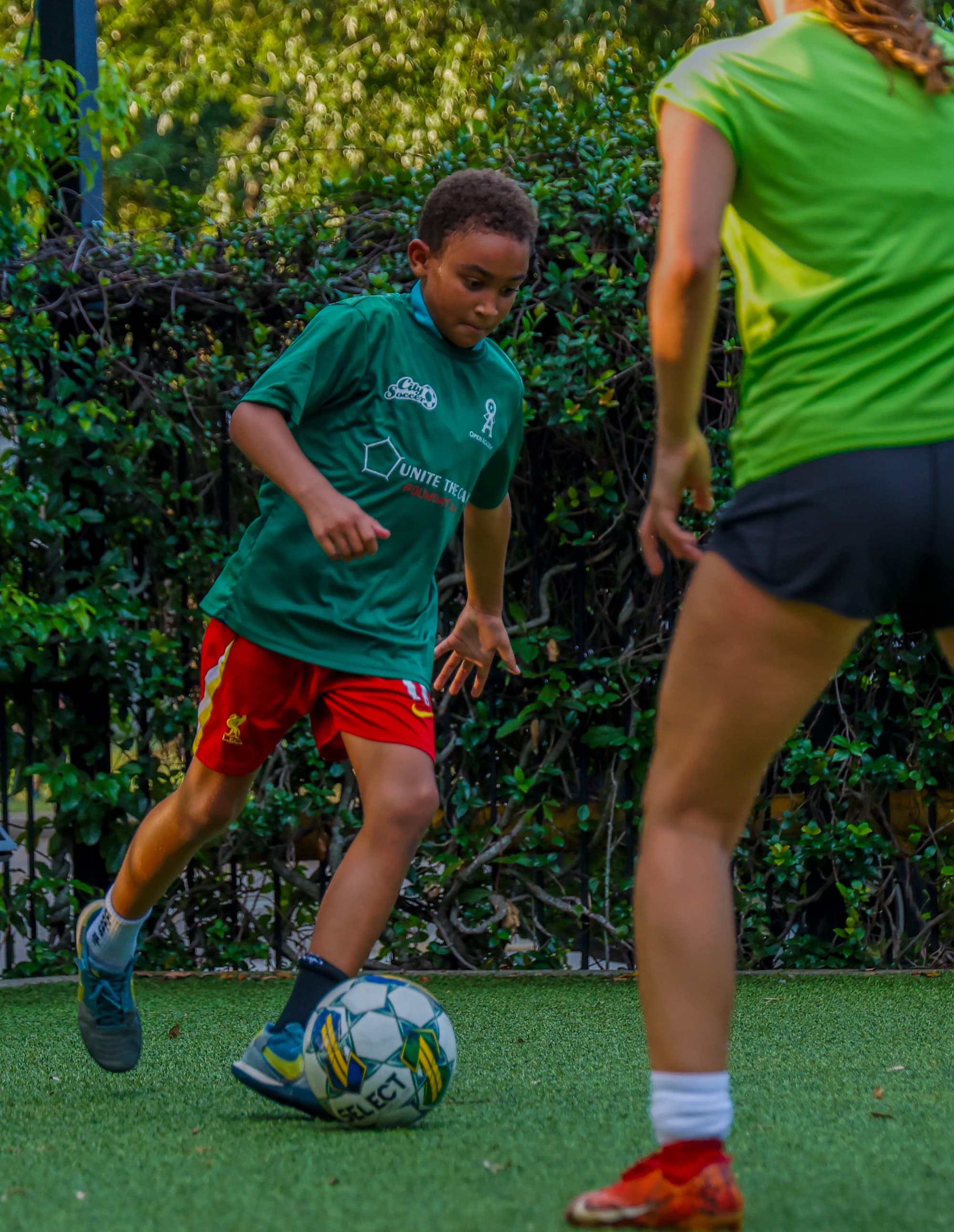 Young player dribbling